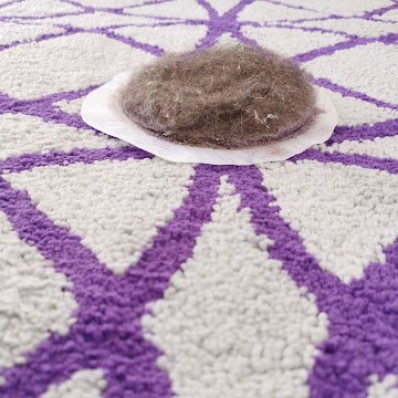 Limpieza profesional de alfombras en Tulum eliminando polvo y suciedad profunda