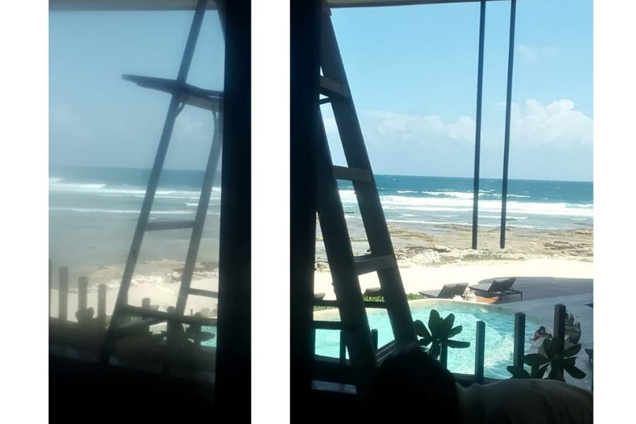 Limpieza de vidrios con salitre frente al mar en Tulum